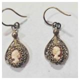 Cameo carved Earrings w/brass tone fish hook style