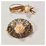 2 gold tone Brooches-both have carved roses