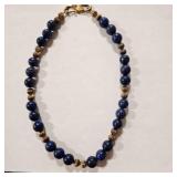 Blue lapis lazuli Necklace, gold tone spacers
