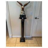 Marble pedestal 39" tall; Mable base eagle is 18"