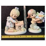 2 Precious Moments figurines