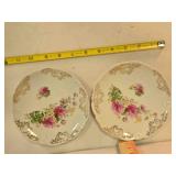 2 matching China saucers, 6" across, flower motif