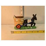 Ceramic donkey pulling cart souvenir