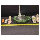 Green glass dish, 5 porcelain shoes