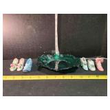 Green 7" glass plate; 6 porcelain shoes