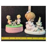 2 Precious Moments figurines