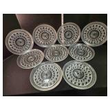 9 pressed glass snack plates, 8 w/glass holder