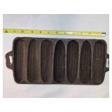 Vintage cast iron corn muffin pan, 11" across