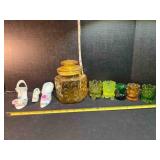 Glass jar, 3 porcelain shoes, 5 shot glasses