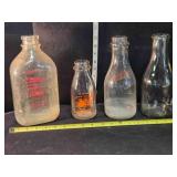 4 vintage milk bottles; Gold Spot, Colvert