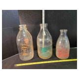 3 vintage milk bottles
