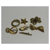 7 gold tone Brooches, Bird, Flower, Star, Circle,