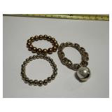 3 Gold Tone Stretch Bracelets, Chain is metal stre