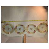 Set of 4 China saucers, 7ï¿½" across