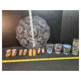 Glass pedestal platter, 4 pair shoes, shot glasses