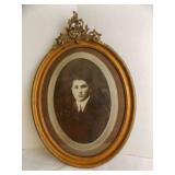 Oval Wooden Picture Frame Ft. A Black And White