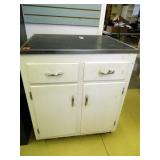 Wooden Cabinet w/metal trimmed top; storage under