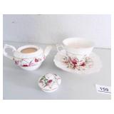 Tea Cup/pitcher with saucer. Rose motif
