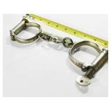 old hand cuffs