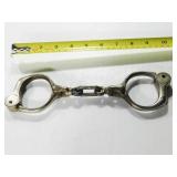 old hand cuffs