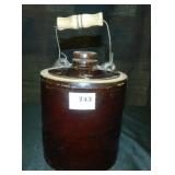 Brown Jug w/wooden handle