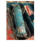 Makita 4" disc grinder in case