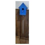 Bird house on garden fork
