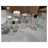 Assorted glass bottles/jars