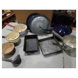 Assorted pots and pans and lids