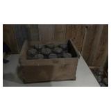 Canning jars in wooden crate
