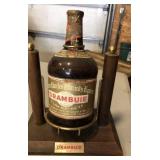 Drambuie liquor bottle in stand