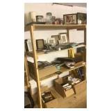 Contents of shelf: picture frames and books plus Contents of shelf: picture frames and books plus