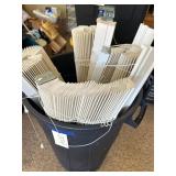 Garbage can full of blinds