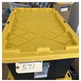 Black and yellow tote with the lid full of