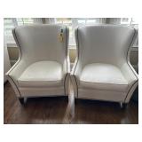 Two matching  barrel back style chairs