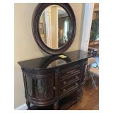 Nice dresser/curio with mirror 42 inches tall by