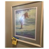 Framed picture of little girl in the ocean