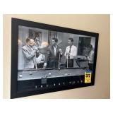 Picture frame picture of the rat pack located