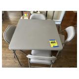 Card table and four matching chairs