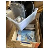 Box of magazines and a box of to go wear