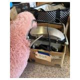 Box of dog toys, and griddle and bed