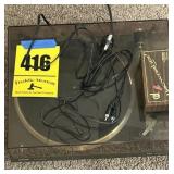 Turning table with vinyl record cleaning kit