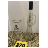 Trumpet bottle and Budweiser glass
