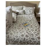 Bed and nightstand upstairs
