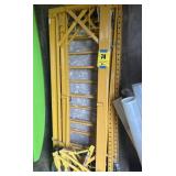 Two layers of scaffolding with outward wheels