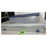 Two long plastic storage bin/totes