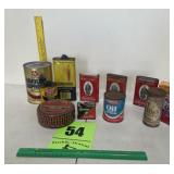 Old paper oil can and collector tins