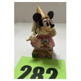 Minnie, mouse demure and sweet