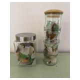 (2) Decorative Jars of Glass