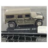 Encased die- cast miniature Hummer